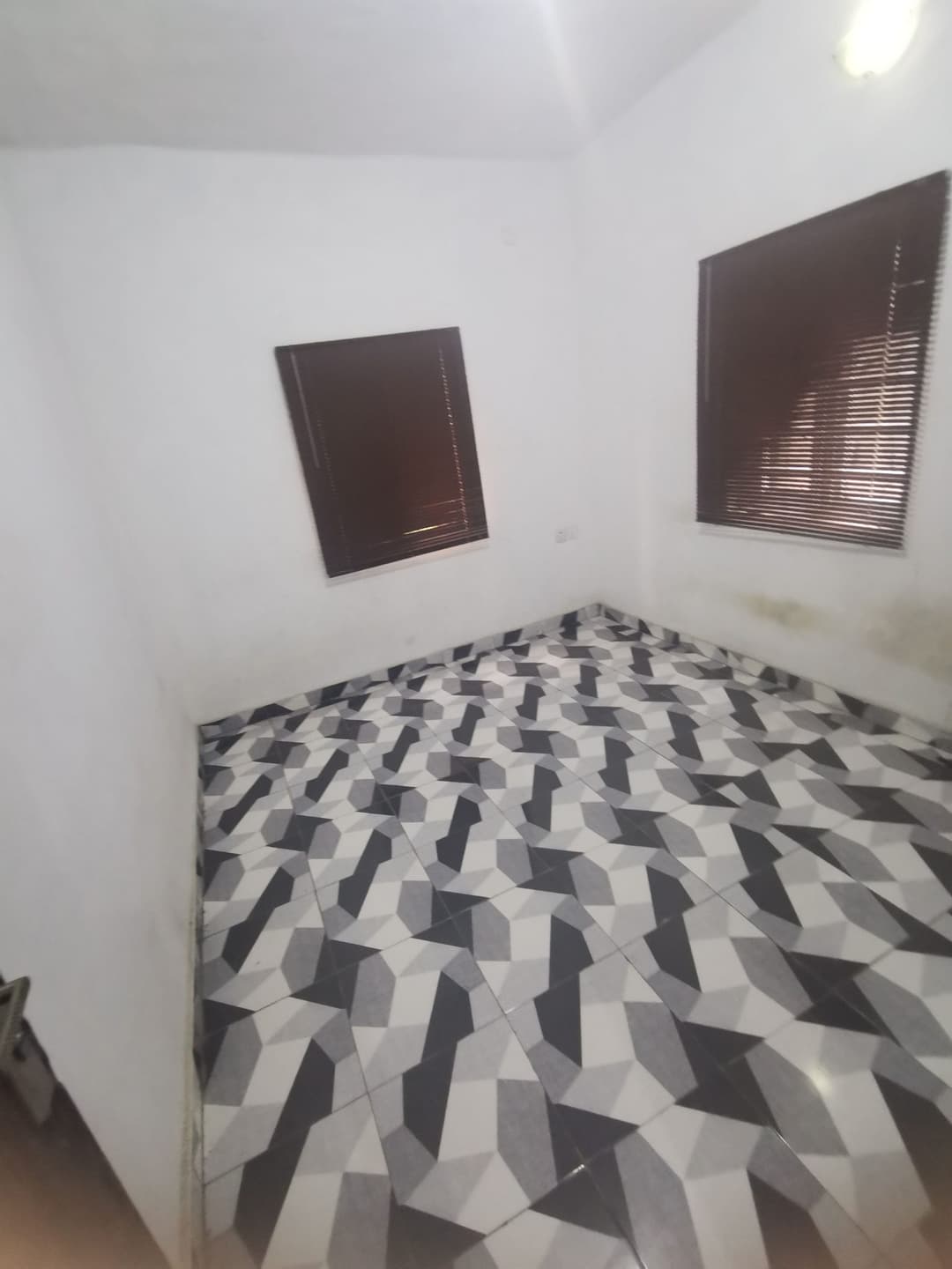 Room in flat for rent in Bucknor, Lagos — 2 bedrooms