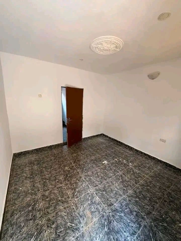 Room in flat for rent in Ago palace, Lagos — 2 bedrooms